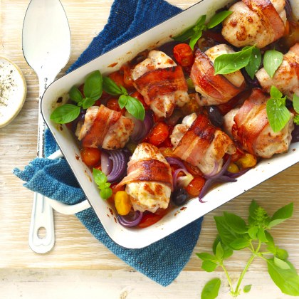 Bacon wrapped chicken thigh tray bake